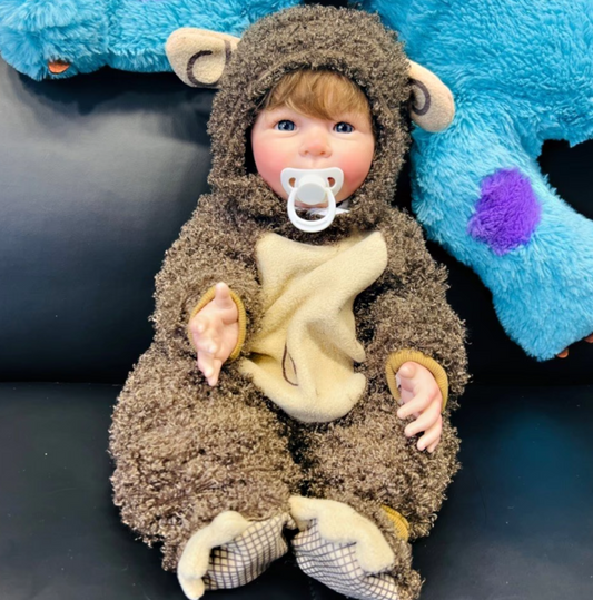 Lisa sovende babydukke med blød stofkrop
