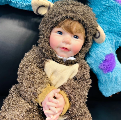 Lisa sovende babydukke med blød stofkrop