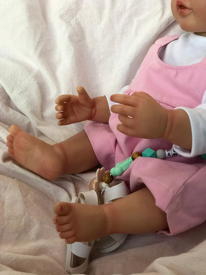 Prinsesse babydukke i vinyl med blå øjne
