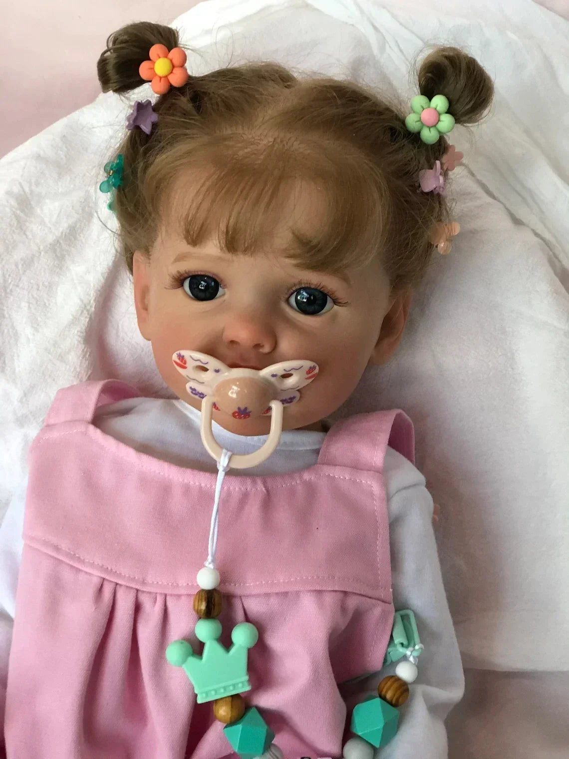 Prinsesse babydukke i vinyl med blå øjne