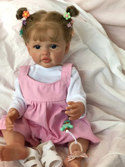Prinsesse babydukke i vinyl med blå øjne