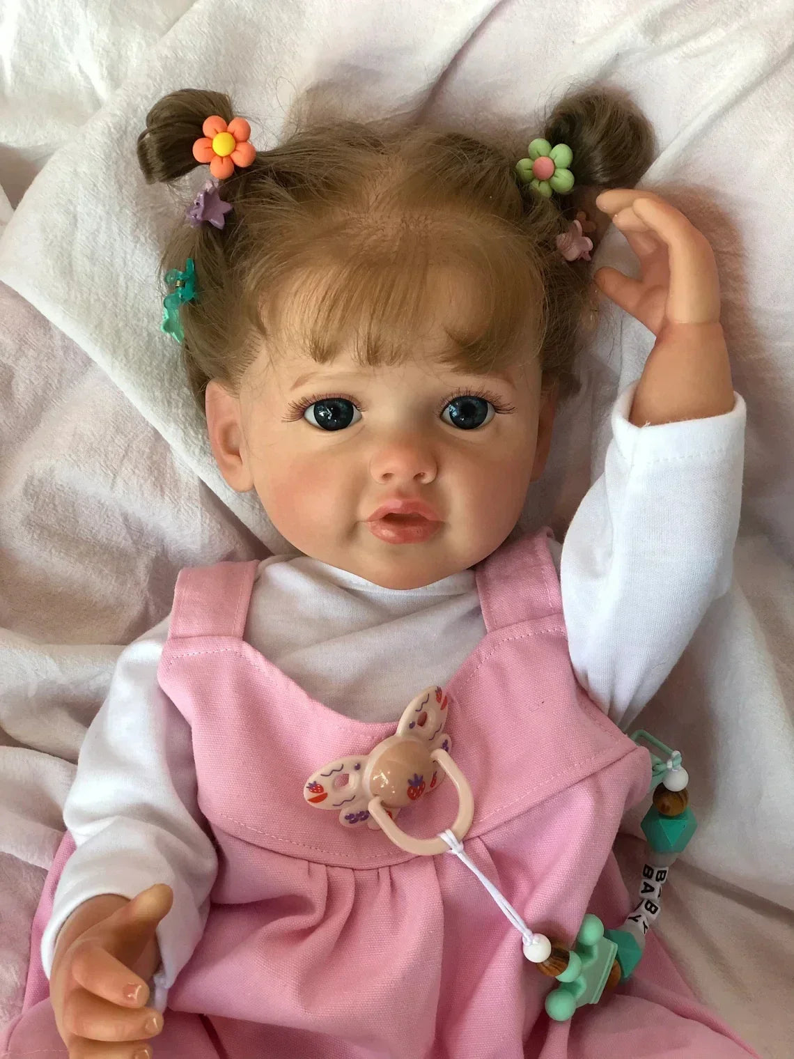 Prinsesse babydukke i vinyl med blå øjne